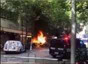  ?? (DR) ?? Le véhicule du terroriste, ici en flammes, était rempli de bouteilles de gaz.