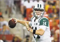  ?? Alex Brandon / Associated Press ?? New York Jets quarterbac­k Sam Darnold looks to pass the ball against the Washington Redskins Thursday in Landover, Md.