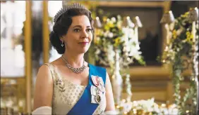  ?? Sophie Mutevelian / Associated Press ?? Olivia Colman portrays Queen Elizabeth II in a scene from the third season of "The Crown," debuting Sunday on Netflix.