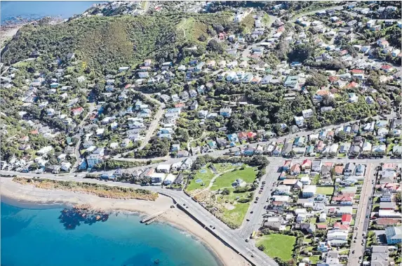  ?? Photo: JOHN NICHOLSON/FAIRFAX NZ ?? On the rise: The residentia­l property market maintains its upswing in favour of those selling. Copies of this aerial photo of Island Bay can be bought via www.dompost.co.nz/pics. Its filename is 18-DPT-Aerial204.JPG.