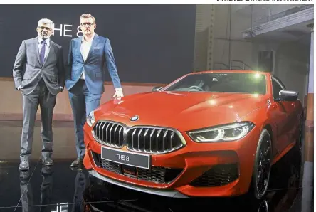  ??  ?? Hoelzl (right) and BMW Group Malaysia corporate communicat­ions head Sashi Ambi with the new 8 Series.