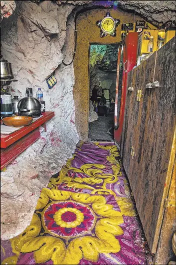  ?? L.E. Baskow Las Vegas Review-Journal @Left_Eye_Images ?? Reclaimed casino carpet lines the bottom of Richard Roman’s home, which measures about 160 square feet, in an abandoned mine shaft in Boulder City.