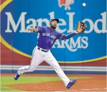  ??  ?? Blue Jays outfielder Teoscar Hernandez hauls in a fly ball in foul territory in Toronto on Monday.