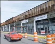  ??  ?? The facade renovation has already begun at the Bryans Road Shopping Center. The center was built in 1974.