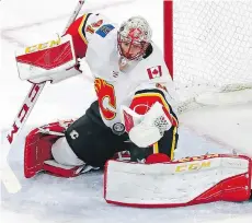  ?? THE ASSOCIATED PRESS ?? The Flames have been without starting goalie Mike Smith, but GM Brad Treliving is optimistic Smith will be back soon.