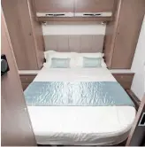  ??  ?? Thanks to the caravan’s 8ft width, the rear bedroom feels uncommonly spacious