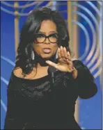  ?? The Associated Press ?? ROUSING SPEECH: Oprah Winfrey accepting the Cecil B. DeMille Award at the 75th Annual Golden Globe Awards in Beverly Hills, Calif., on Sunday.