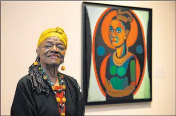  ?? The Associated Press file ?? Faith Ringgold in front of a painted self-portrait for her exhibition “American People, Black Light : Faith Ringgold’s Paintings of the 1960s” in June 2013.