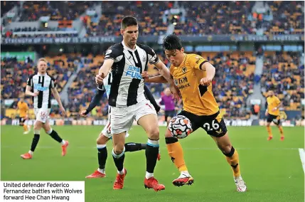  ?? ?? United defender Federico Fernandez battles with Wolves forward Hee Chan Hwang