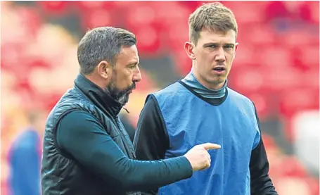  ?? Picture: SNS ?? Derek McInnes with captain Ryan Jack, one of the players whose future at the club is unclear.