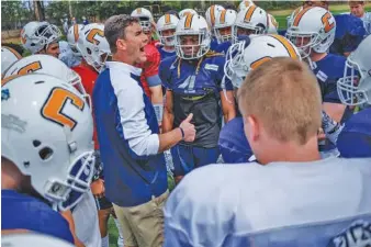  ?? STAFF PHOTO BY DOUG STRICKLAND ?? Tom Arth is set to begin his first preseason camp as UTC football coach today. The Mocs will hold two sessions of practice today at Scrappy Moore Field, splitting the workouts between returning players and newcomers.