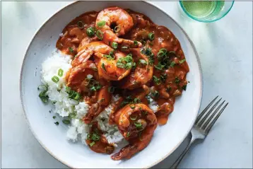  ?? CHRISTOPHE­R SIMPSON — THE NEW YORK TIMES ?? Shrimp Creole revels in improvisat­ion, making it perfect for these tumultuous, unpredicta­ble months.