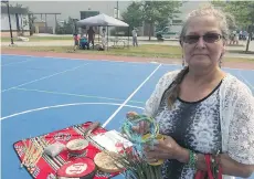  ?? JENNIFER SALTMAN ?? Gwen Campbell-McArthur brought sweetgrass to a First Nations water ceremony in support of wildfire evacuees.