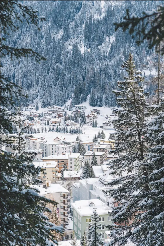  ?? PHOTOS BY CLARA TUMA / THE NEW YORK TIMES ?? For the second year in a row, the World Economic Forum scrapped its annual meeting in the the Alpine resort town of Davos, Switzerlan­d, above, because of the coronaviru­s pandemic.