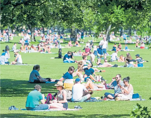  ?? Picture: SNS. ?? The scene in The Meadows, Edinburgh, on Sunday after the easing of lockdown restrictio­ns during the coronaviru­s pandemic.