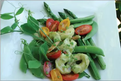  ?? PHOTOS BY NANCY LINDAHL — CONTRIBUTE­D ?? Spring prawn salad with avocado green goddess.