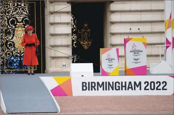  ?? ?? Britain’s Queen Elizabeth II (AP/Matt Dunham) attends the Birmingham 2022 Commonweal­th Games Queen’s Baton Relay event Thursday outside Buckingham Palace in London.