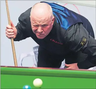  ?? ?? John Higgins resumes today tied 4-4 with Mark Allen.