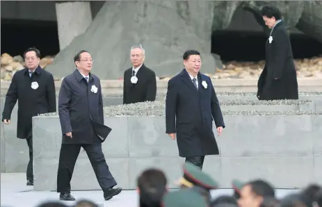  ?? DU YANG / CHINA NEWS SERVICE ?? President Xi Jinping attends the State memorial ceremony in Nanjing, Jiangsu province, on Wednesday to mark the 80th anniversar­y of the Nanjing Massacre. Xi and other senior officials joined people from different walks of life at the memorial hall for...