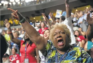  ?? LIPO CHING/STAFF ?? California delegate Patt Sanders cheers during the 2016 Democratic National Convention in Philadelph­ia on Monday.