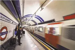  ?? NurPhoto / Getty Images ?? Above: London’s Undergroun­d tube is largely free of the drug parapherna­lia, feces and trash seen in downtown San Francisco BART stations.