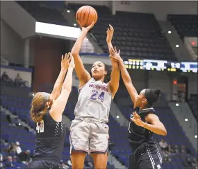  ?? Jessica Hill / Associated Press ?? Napheesa Collier, shown here against Southern Connecticu­t State, had 17 points against St. John’s Friday in the Paradise Jam.