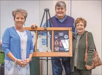  ?? Contribute­d ?? From left: Superinten­dent Denia Reese, with Phil Ledbetter and former superinten­dent Beth Kellerhals, at Reese’s retirement party. All three were principals of Graysville Elementary School. Ray Boaz, with DHW Architects, made the artwork on the easel as a gift to Reese. It is the transom window that was above Reese’s classroom door in the old part of Graysville Elementary, with logos from every school.