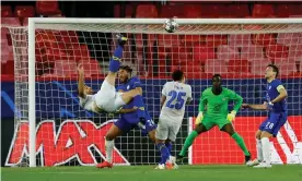  ??  ?? Porto’s Mehdi Taremi scores but it was too late to stop Chelsea. Photograph: Marcelo del Pozo/Reuters