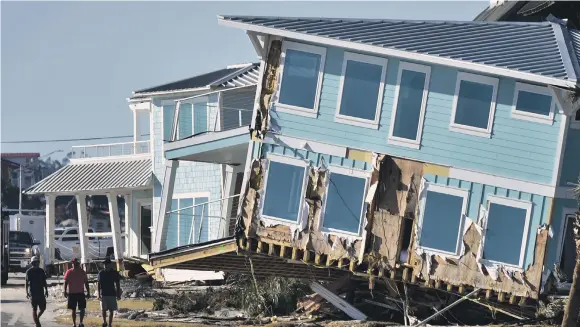  ?? AFP ?? Damage caused by Hurricane Michael in Mexico Beach, Florida, where internet and communicat­ions breakdowns have hampered emergency services