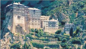  ?? PICTURE: SHUTTERSTO­CK ?? REMOTE RETREAT: The monastery of Simonos Petra on Mount Athos, Greece.