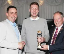  ??  ?? Brian Dorrian and Cathaoirle­ach of Sligo County Council, Cllr. Seamus Kilgannon presenting Shay Doherty with the U-19 Award