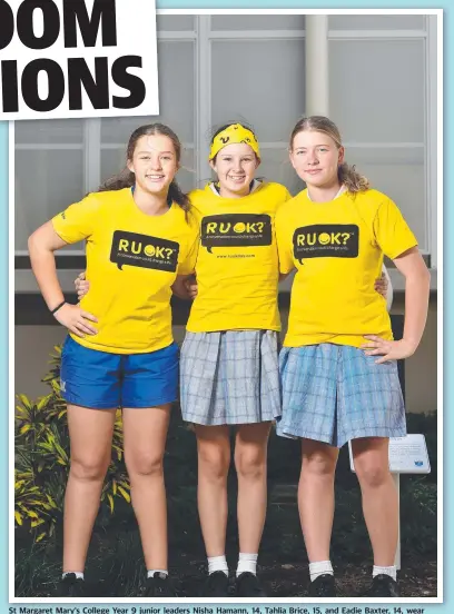  ?? Picture: SHAE BEPLATE ?? St Margaret Mary's College Year 9 junior leaders Nisha Hamann, 14, Tahlia Brice, 15, and Eadie Baxter, 14, wear yellow shirts and bandannas as they strive to make a difference by supporting RUOK? Day.