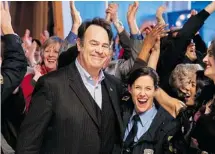  ?? DOMINIQUE BINOIST ?? Dan Aykroyd and actor Sally Clelford share a scene from a promotiona­l short film shot in March promoting Ottawa actors.