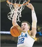 ?? Wally Skalij Los Angeles Times ?? UCLA’S TJ LEAF dunks against Kent State during the Bruins’ first-round victory in the NCAA tournament.