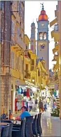  ??  ?? VENETIAN INFLUENCE: Corfu Town is a favourite with tourists. Left: Mal and Deri during their break