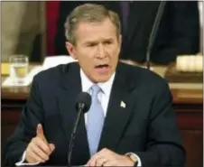  ?? DOUG MILLS — THE ASSOCIATED PRESS FILE ?? In this Jan. 29. 2002, file photo, President George W. Bush labels North Korea, Iran and Iraq an “axis of evil” during his State of the Union address on Capitol Hill.