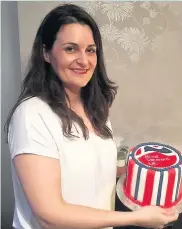  ??  ?? Sophie Faldo, winner of The Great British Bake Off 2017, with her fondant cake for the tea party