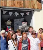  ??  ?? Launch Members of the Trashion Fashion group, volunteers and supporters gather for the official opening of the Cadzow Street branch, left and above