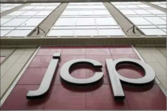  ?? MARY ALTAFFER — THE ASSOCIATED PRESS FILE ?? In this photo, the J.C. Penney logo hangs outside the Manhattan Mall in New York. J.C. Penney has named Jill Soltau, who most recently served as president and CEO of fabric and crafts chain Jo-Ann Stores, to be its next CEO, effective.