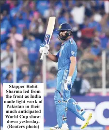  ?? ?? Skipper Rohit Sharma led from the front as India made light work of Pakistan in their much anticipate­d World Cup showdown yesterday. (Reuters photo)