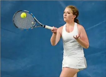  ?? SEAN D. ELLIOT/THE DAY ?? Stonington’s Charlotte Johnstone returns a shot from Waterford’s Alaina Moger during their ECC girls’ tennis tournament singles semifinal Thursday at Mystic Indoor Sports. Johnstone, the No. 6 seed, rallied to upset the second-seeded Moger 1-6, 6-4,...