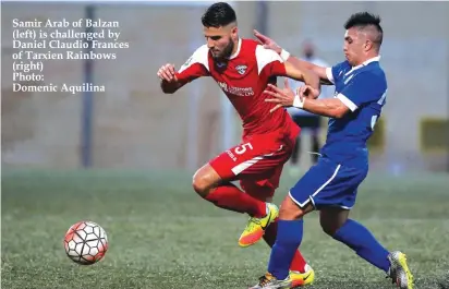  ??  ?? Samir Arab of Balzan (left) is challenged by Daniel Claudio Frances of Tarxien Rainbows (right) Photo: Domenic Aquilina