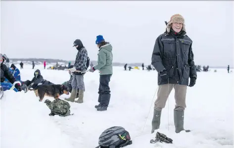  ?? LIAM RICHARDS ?? Darryl Toulejour was one of many taking part in the ice fishing derby on Lac La Loche as part of La Loche winter festival on Friday.