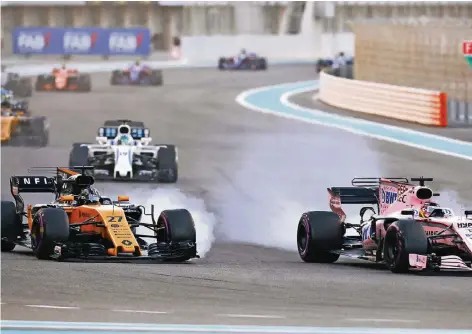  ?? FOTO: IMAGO ?? In Abu Dhabi lieferte Nico Hülkenberg (links) eine starke Leistung ab. Vor allem mit Sergio Perez lieferte er sich intensive Duelle.