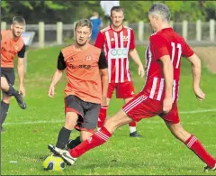  ?? ?? A Taste of England player tries to find a pass
Ref: 41-2021J