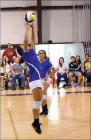  ?? Westside Eagle Observer/MIKE ECKELS ?? Lady Bulldog Kaylee Morales passes the ball off during the Decatur-NWA Classical Academy volleyball scrimmage at Spartan gym in Bentonvill­e Aug. 2. This game was a precursor to the opening of the regular season match with Eureka Springs Aug. 21 at Peterson Gym in Decatur.