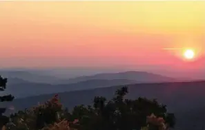  ?? Photo by Bill Owney ?? ■ An afternoon spent climbing Oklahoma’s Kiamichi Mountains in a 2020 Camry Hybrid XLE is filled with rewards, including this view from Panorama Vista on the Talimena National Scenic Byway about 140 miles north of Texarkana.