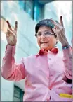  ??  ?? Bharatiya Janata Party (BJP) candidate for Delhi chief minister, Kiran Bedi shows her ink marked finger after casting her vote at a polling station in New Delhi (AFP)