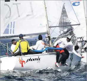  ??  ?? CLOSE CONTENDER: Hout Bay Yacht Club follows close behind Royal Cape Yacht Club on the first day of the Lipton Cup Challenge.