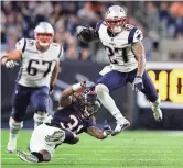  ?? KEVIN JAIRAJ/USA TODAY SPORTS AZCENTRAL SPORTS ?? BOB MCMANAMAN Running back D.J. Foster jumps over Houston Texans cornerback Treston Decoud (31) during a preseason game Aug. 19 while he was with the New England Patriots.